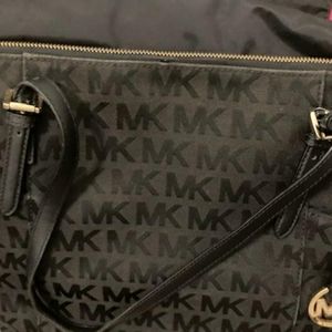 Black Michael Kors Tote. Second photo shows inside